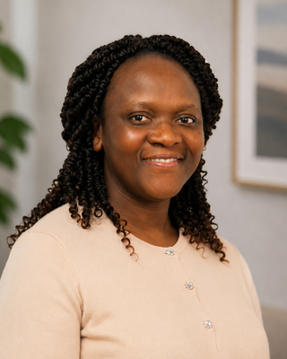 Photo of Toyin Arowosegbe, Psychiatric Nurse Practitioner, PMHNP