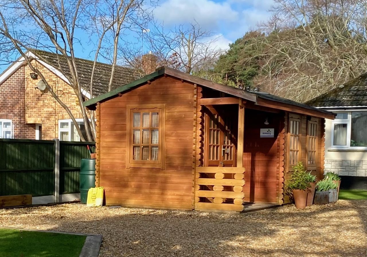 Gallery Photo of Oasis Psychology offers therapeutic appointments at The Cabin. A safe and warm space in a residential area near Wimborne. 
