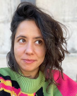 Photo of Taline Schubach, Psychotherapist, MA, HCPC-Art Therap.