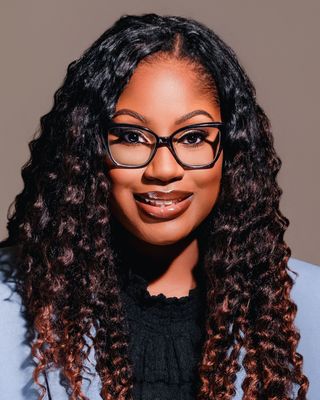 Photo of Brigiette Lewis, Counselor, LGPC