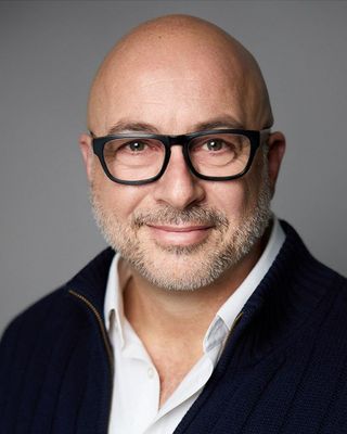 Photo of Dr. John Coumbe-Lilley, Licensed Professional Counselor, PhD, LPC, ALMFT, CMPC, CSCS