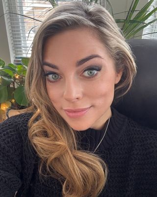 Photo of Alli Kaminski, Counselor, MA, LMHC, RYT, CCTP-II, EMDR II