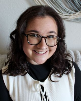 Photo of Emily Warren, Licensed Mental Health Counselor, LMHC, NCC, MS, EdS