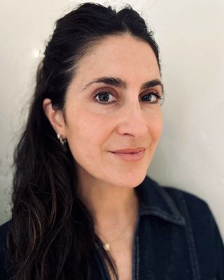 Photo of Caitlin May, Pre-Licensed Professional, MA, MSN, APRN