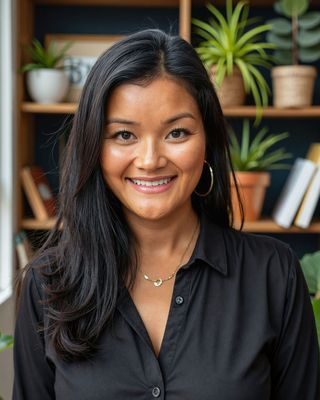 Photo of Jen Bondoc, Registered Psychotherapist, MA, BEd, BA, ECE