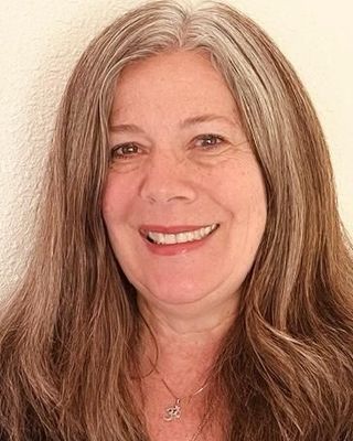 Photo of Abbe McClenahan, Counselor, MA, MBA, LMFT, LCPC