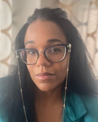Photo of Dalila Corporan, Licensed Mental Health Counselor, MS, LMHC, QS