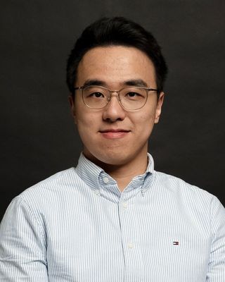 Photo of Dr Titian Tam, Psychologist, PsychD, HCPC - Clin. Psych.