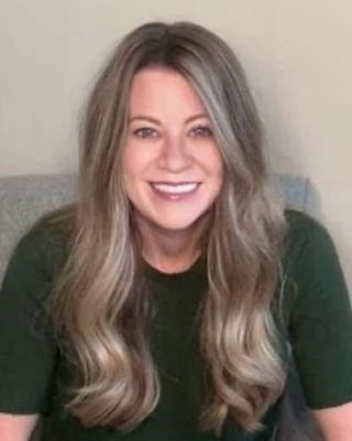 Photo of Lora Plohal, Counselor, MS, LAC