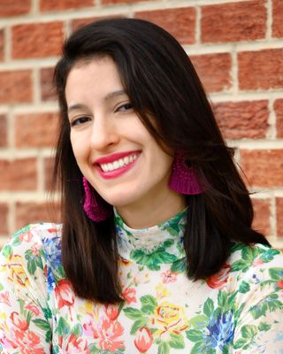 Photo of Lex Irias, Licensed Professional Counselor Candidate, MS, LPCC, ADDC