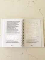 Gallery Photo of The back of the journal comes with 168 positive affirmations and 126 writing prompts to help you in your writing process.