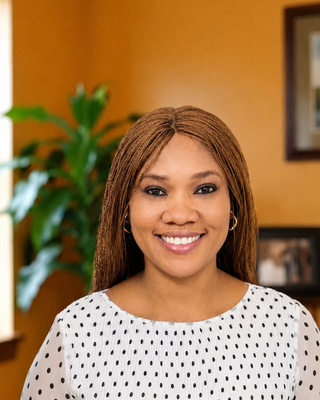 Photo of Dr. Isi Etakibuebu, Psychiatric Nurse Practitioner, DNP, PMHNP, BC, APRN