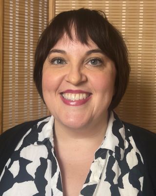 Photo of Kelly Dupuis, Licensed Master Social Worker, LMSW, MFA