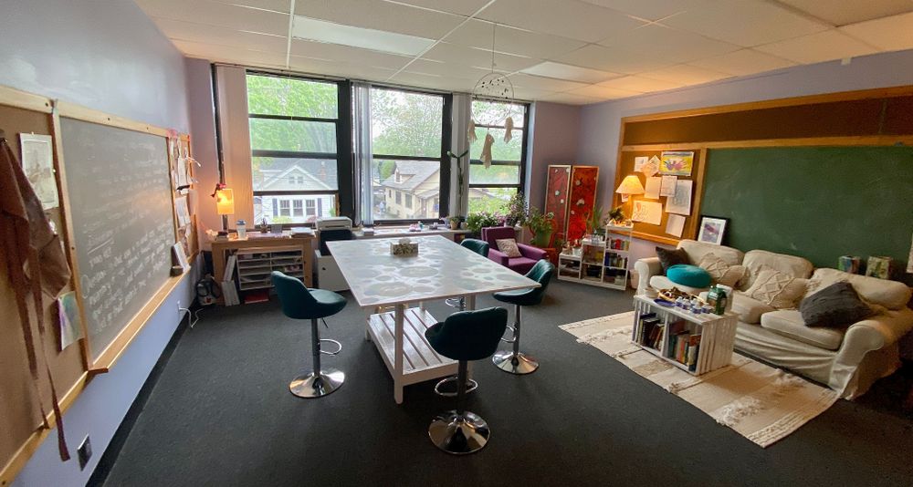 Located in an old school, the studio (rumored to be the old art room) gets great light! Clients have the option to sit at the couch or table to create