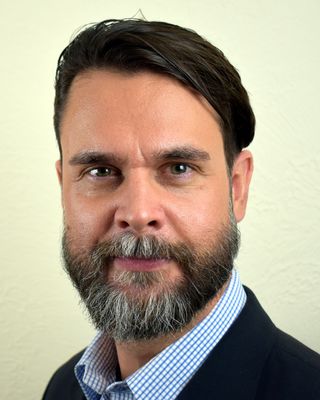 Photo of Joshua Burgett, Psychiatric Nurse Practitioner, PMHNP