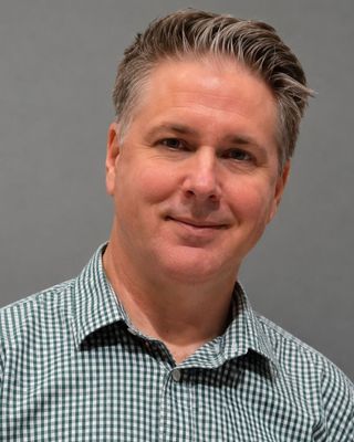 Photo of Andy Vuorela, Counselor, MS, LIMHP, NCC, JD