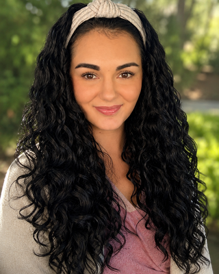 Photo of Emily Spradlin, Pre-Licensed Professional, M.Ed.