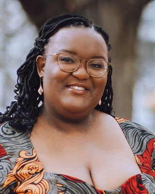 Photo of Ayo Oluwatudimu - Therapy with Ayo, Psychotherapist