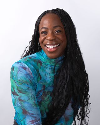Photo of Joy Ajele, Registered Psychotherapist (Qualifying), MA