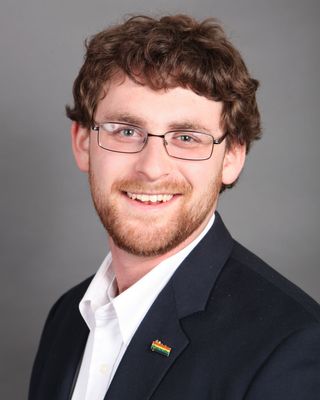 Photo of Travis Moore, MEd, LPC, NCC, Licensed Professional Counselor