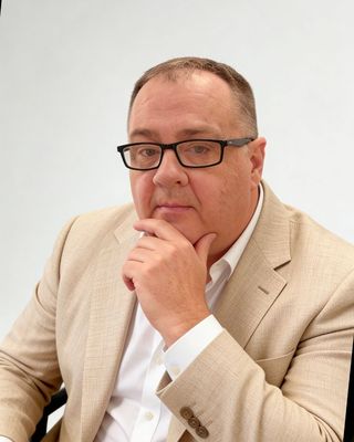 Photo of Dennis Garfield Barrie, Psychologist, BA hons, MC