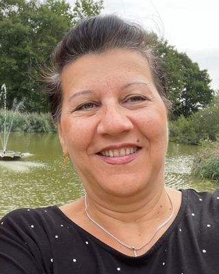 Photo of Genoveva Muresan, Psychotherapist, MSc, PNCPS Acc.