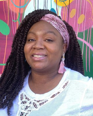Photo of Kemi Ayanfalu, Marriage & Family Therapist in Greenville, CA
