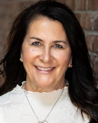 Photo of Susan Marie Howell, Licensed Master Social Worker, LLMSW