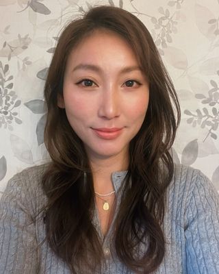 Photo of April Jiangge Li, Counsellor, RCAT, RCC