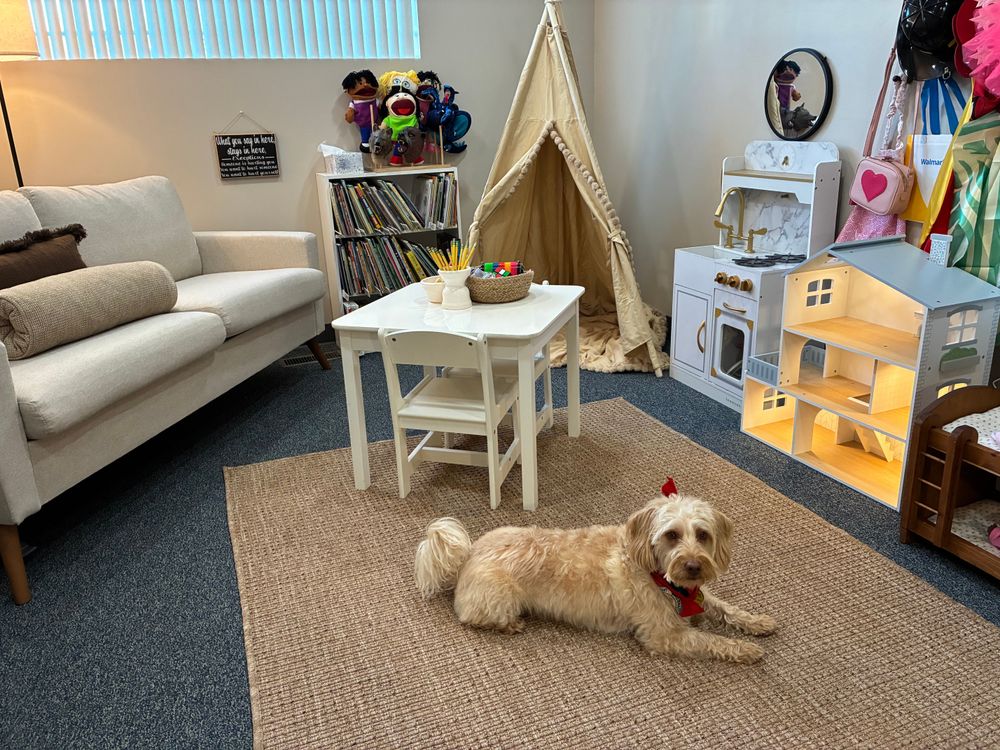 My therapy dog, Leo, loves my clients!