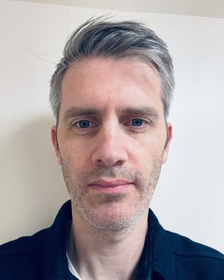 Photo of Joshua Holmes, Psychotherapist, PhD, ACP