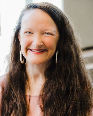 Photo of Leslie Pechkurow, Licensed Professional Counselor, LPC, RYT, RPT-S
