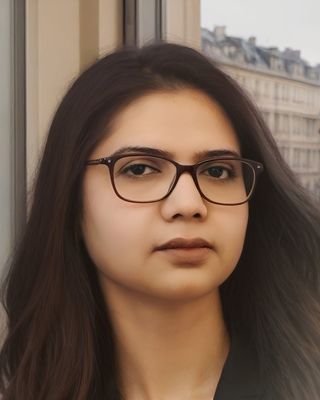 Photo of Eman Maher, Registered Psychotherapist, MACP, MBA IT, MA Econ