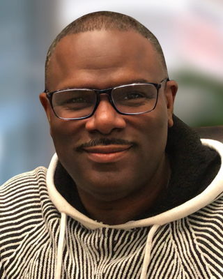 Photo of Elliott Hewett, Clinical Social Work/Therapist, LICSW