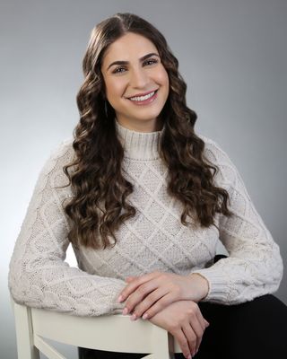 Photo of Denise Taher, RP, MA, MSc, Registered Psychotherapist