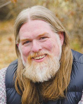 Photo of Chris Uhles, Licensed Clinical Mental Health Counselor, MA, LCHMC, NCC