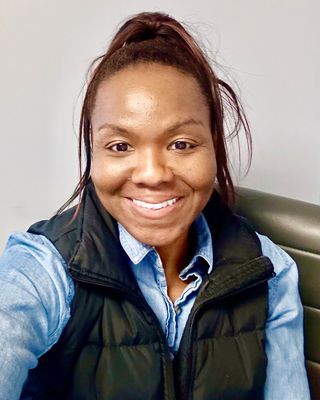 Photo of Kyra E Contreras, MSW, CPhT