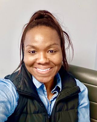 Photo of Kyra E Contreras, MSW, DV, CPhT