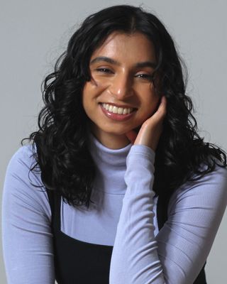Photo of Amal Rashid, Counsellor, BSc, MCP, RCC