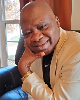 Photo of Dr. Michael A Okoye, Psychiatric Nurse Practitioner, PhD, CRNP, PMHN-BC, ANP-B