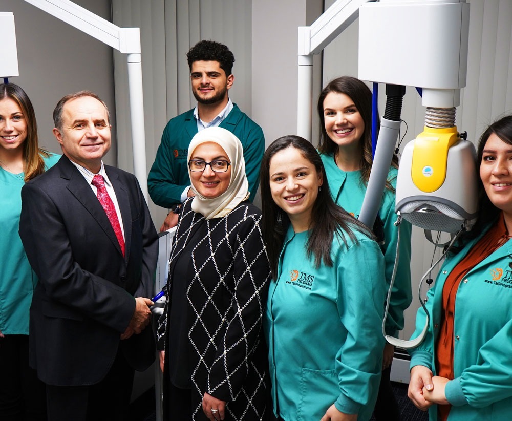 Gallery Photo of Our team with Deep TMS machine