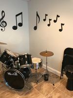 Gallery Photo of We offer sessions in-home, in-facility, and in our clinic. Our clinic is home to a variety of larger instruments including drum sets and pianos.