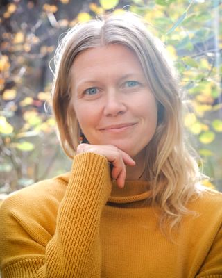 Photo of K. Moxie Bauschke, Counselor, LMHC, E-RYT