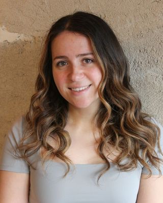 Photo of Briana Gregoris, Registered Psychotherapist, RP, MTA, MMT, BFA