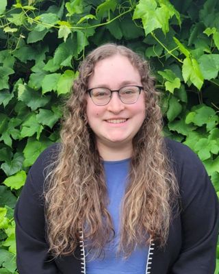 Photo of Emily Muma, Pre-Licensed Professional