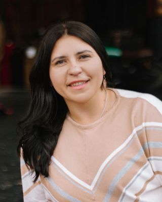Photo of Andriana Teslyuk, Registered Psychotherapist, MACP, CCC, RN, BScN, SEP