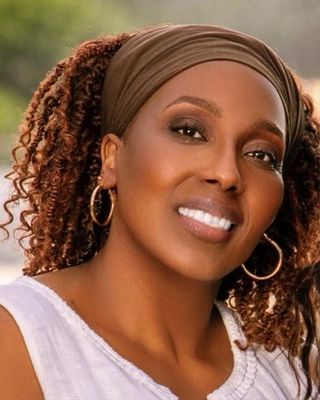 Photo of Joanna Ahounou - Restore Psychiatric Wellness, Psychiatric Nurse Practitioner, MSN, PHMNP, BC