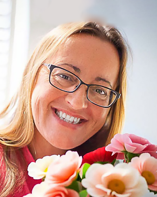 Photo of Courtney Surigao, Licensed Clinical Mental Health Counselor, LCMHC