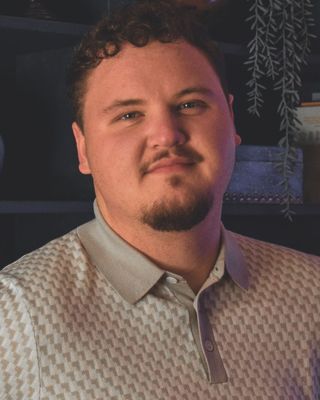 Photo of Zach Burck, Counselor, LMHCA, MSEd