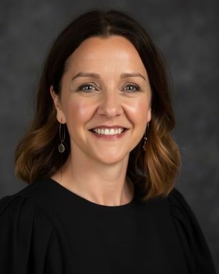 Photo of Aisling Tarleton, Psychotherapist, MA, MIAHIP